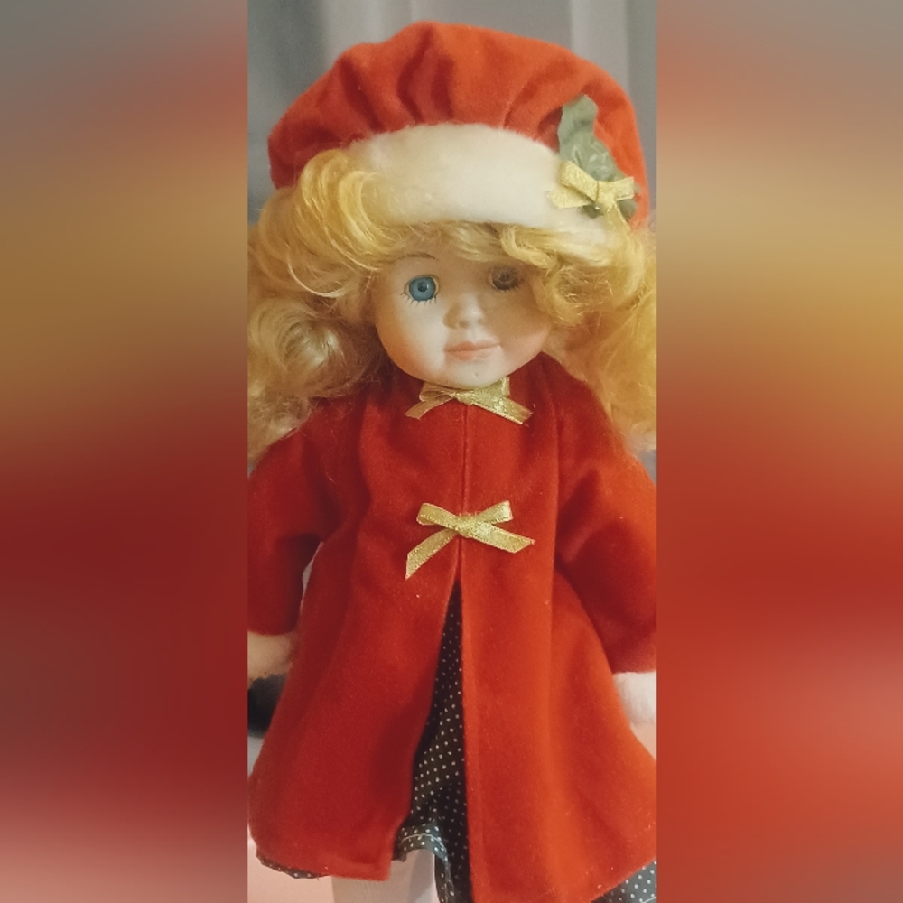Elegant Red and Gold Dolls with Accessories